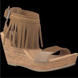 Minnetonka Poppy fringe cork wedge platform sandals.